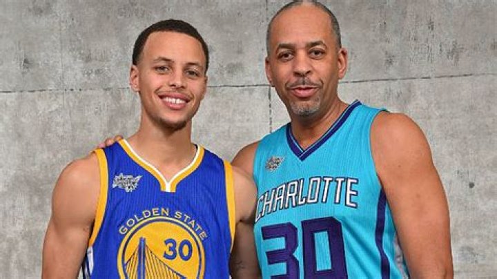 Seth Curry Dell Curry and Stephen Curry and family pose for a portrait
